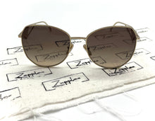 Lade das Bild in den Galerie-Viewer, Luxury Off-Price Fashion by Zapplaz | Prada Sonnenbrille
