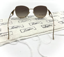 Lade das Bild in den Galerie-Viewer, Luxury Off-Price Fashion by Zapplaz | Prada Sonnenbrille
