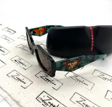 Lade das Bild in den Galerie-Viewer, Luxury Off-Price Fashion by Zapplaz | Prada Sonnenbrille
